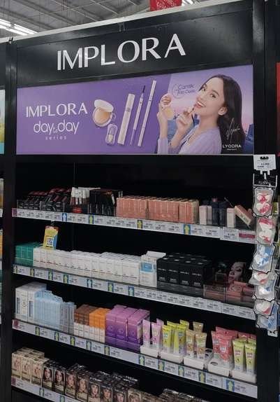 IMPLORA signage